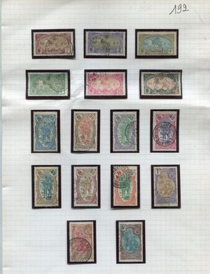 a group of stamps on a piece of paper on a table
