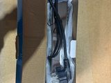 a box that has a charger and a cord in it