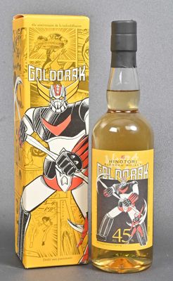 a close up of a bottle of alcohol next to a box