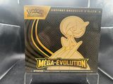 un gros plan d'une boîte sur laquelle figure une figurine de Pokémon