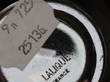 a label on a bottle of wine that is labeled with a price