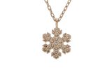 a gold necklace with a snowflake pendant on a chain