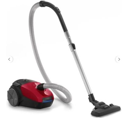 a red and black vacuum cleaner and a black and white vacuum