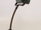 a lamp that is sitting on a table next to a cord