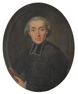 portrait of a man in a black coat holding a brush