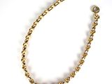 a close up of a gold chain bracelet with a white background