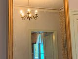 a large mirror on the wall in the room