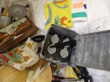 many items that are sitting on a bed together