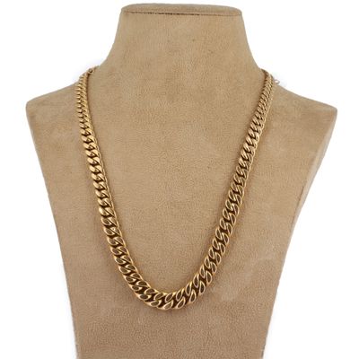 un collier à chaîne en or sur un mannequin mannequin mannequin mannequin mannequin mannequin mannequin mannequin mannequin mannequin
