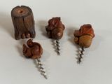 three wine corks that are sitting on a table