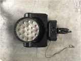 an overhead view of a light on a concrete surface