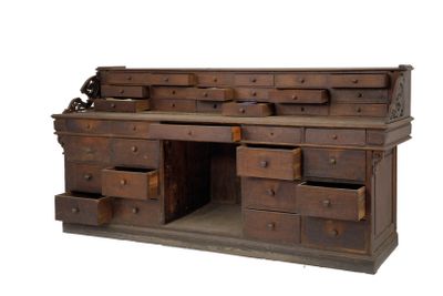 an old wooden desk with drawers and drawers on it