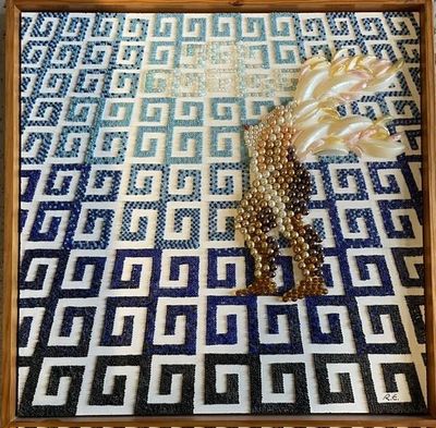 une photo d'un tapis bleu et blanc