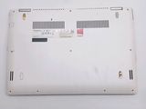a white laptop that is sitting on a table