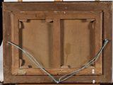 an old wooden easel with a painting on it sitting on a table