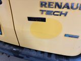 a close up of the rear end of a yellow truck