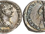 une pièce d'argent portant l'image d'une femme et d'un homme