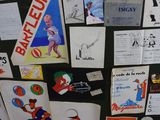 many different types of posters on a bulletin board