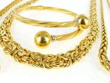 gold plated necklace, bracelet, and ring set with a heart charm