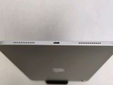 a close up of the back of an apple ipad with a white background