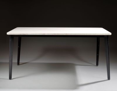 rectangular dining table with black legs and a white marble top