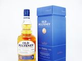 a bottle of old pultenney whisky next to a blue box