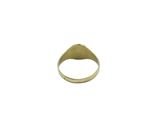 a close up of a gold ring on a white background