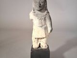 an image of a statue of a woman with a scarf on her head