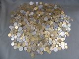 a lot of coins that are on the table