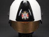 a white helmet with a gold crown on top of it
