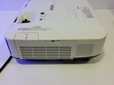 an image of a projector sitting on top of a white table