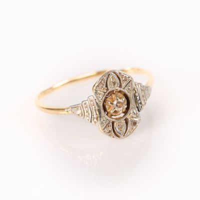 . Bague en or de deux tons sertie d'un diamant rond, début X… - Photo 1