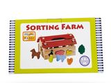 a book with a picture of a wooden toy farm on it