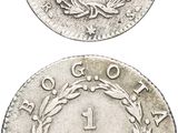 two silver coins, one of which has a crown and the other of which is a laurel