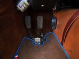 a close up view of a car ' s pedals and brake pedals