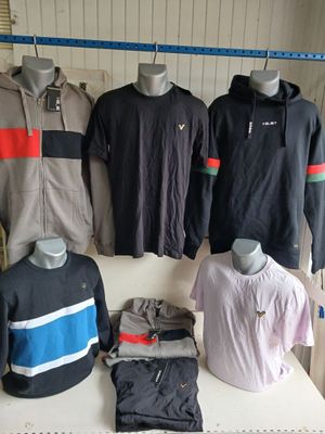 a lot of clothing on display in a store