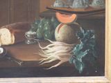 a painting of a still life with bread and vegetables