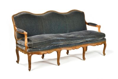 a couch that is sitting on a white surface