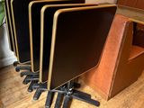 a group of chairs that are sitting in a room