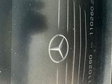 a mercedes logo on the front of a car