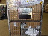 a metal cart with a bunch of boxes on top of it