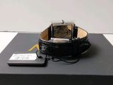 a watch that is sitting on top of a box