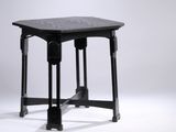 a black table with a black top and a black base