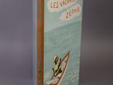a book that has a picture of a man on a surfboard