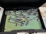 a box full of screws and nuts in it