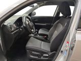 the interior of a car with the door open and the driver ' s seat up