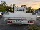 a white truck that is parked in a parking lot