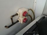 a picture of a fire hydrant with a hose attached to it