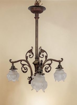 an image of a chandelier hanging from a ceiling in a room