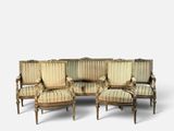 une photo représentant un ensemble composé de quatre chaises et d'un canapé